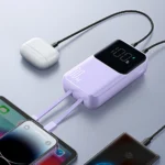 Joyroom JR-PBC06 Power Bank 10000mAh 30W σε μωβ χρώμα με ενσωματωμένα καλώδια USB-C και Lightning.
