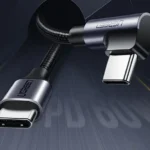 Γκρι γωνιακό καλώδιο Ugreen USB-C σε USB-C 60W 2m για γρήγορη φόρτιση κινητών και laptop.